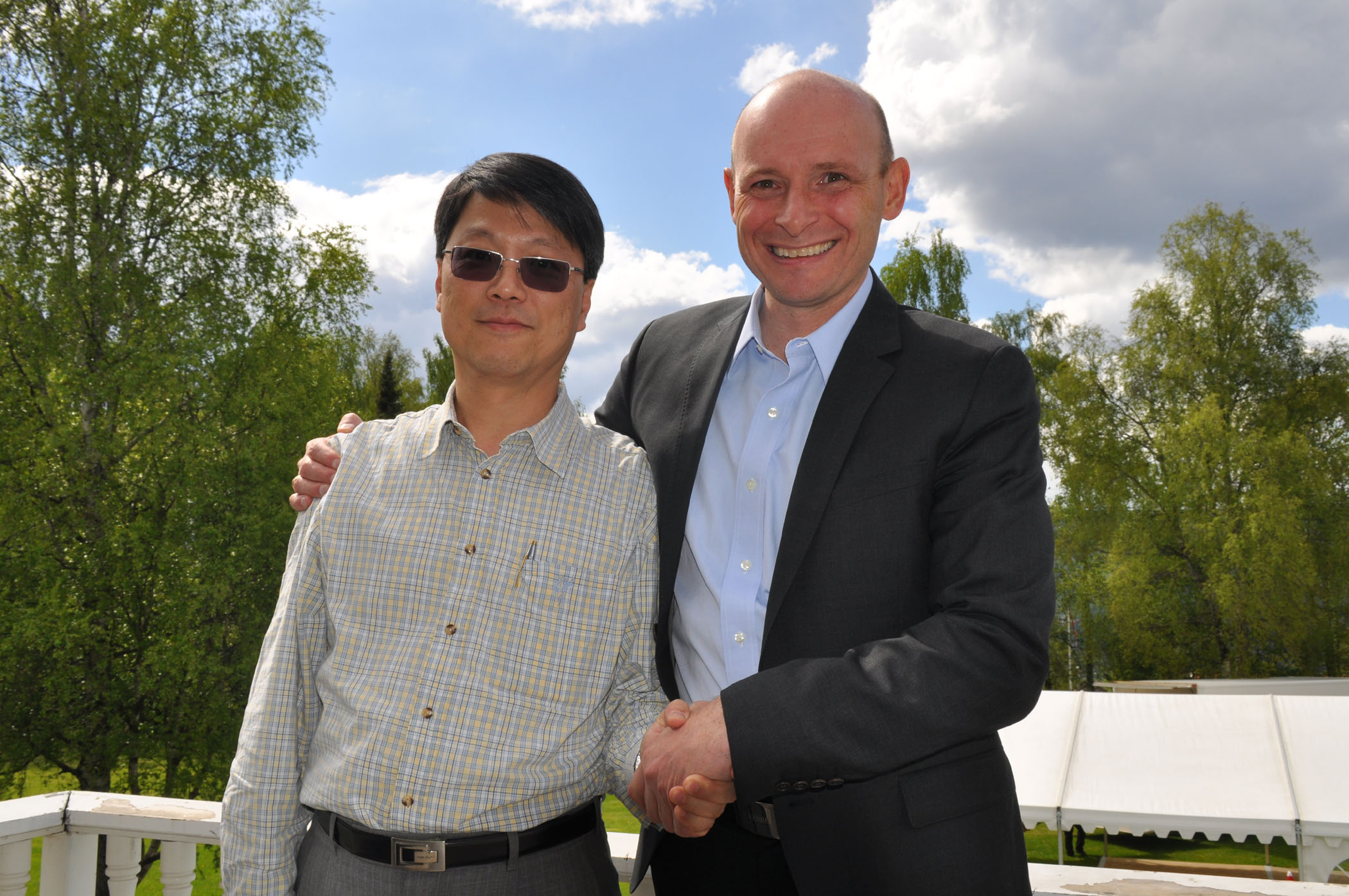 Jetronic科技公司总裁与Energy Micro公司 CEO 合影