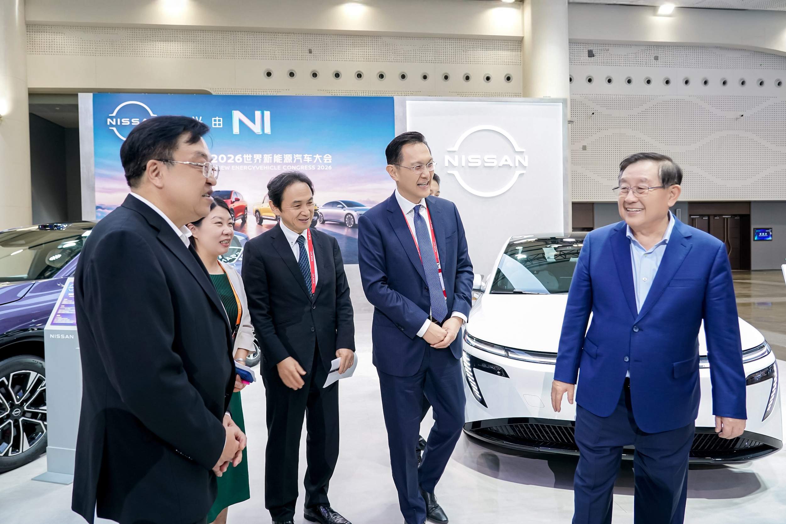4-zhongguokexuejishuxiehuimingyuzhuxi-shijiexinnengyuanqichedahui-wnevc-zhuxiwangang-youyi-hainanshengweishujifengfei-zuoyi-lilinrichanqichezhantai-1.jpg